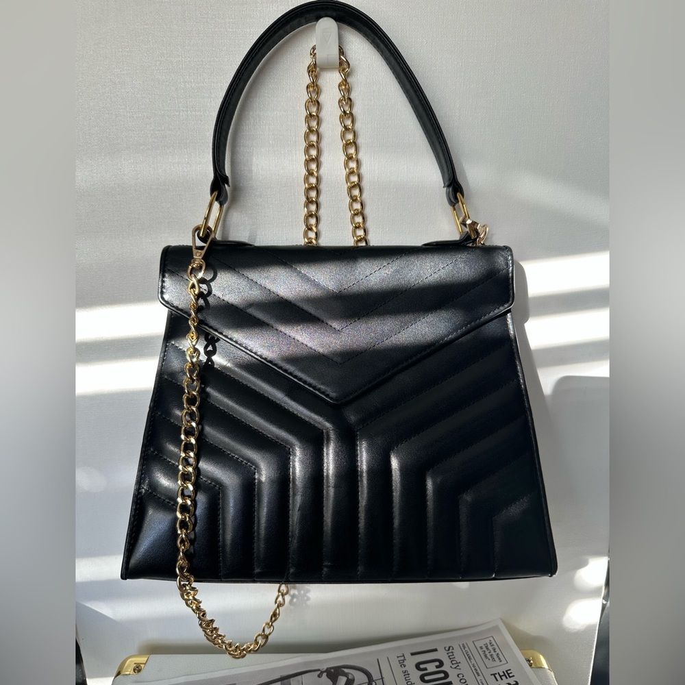Yves Saint Laurent Vintage Kelly top handle chevron leather bag
